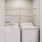 side-by-side washer/dryer units in laundry closet