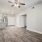 spacious living room next to kitchen