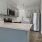 a kitchen with white cabinets